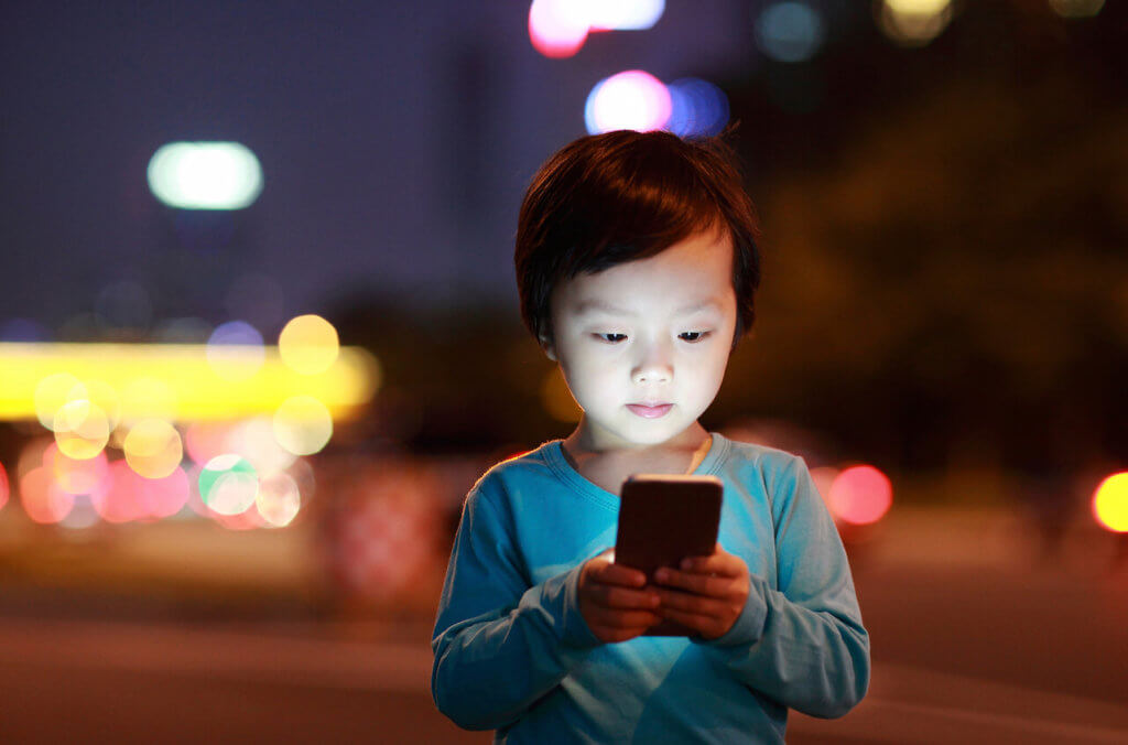 Young child with smartphone