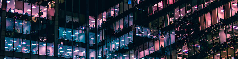 Office building exterior windows at night
