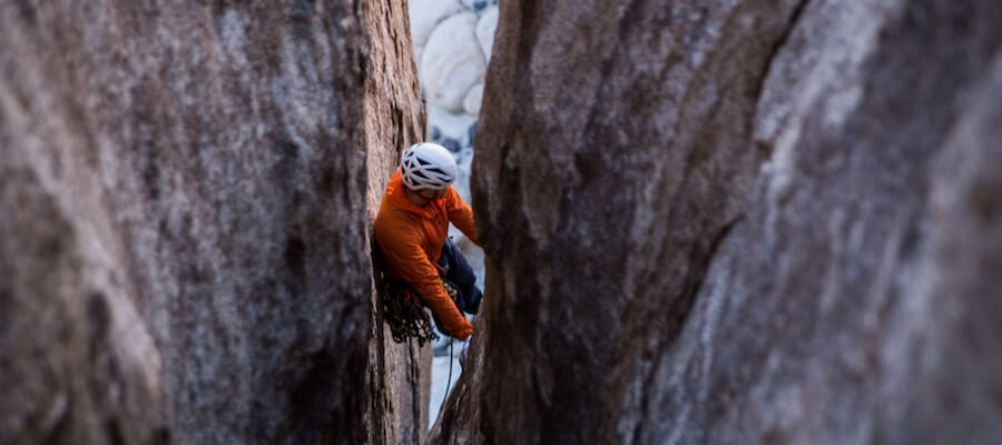 Mountain climber in crevice